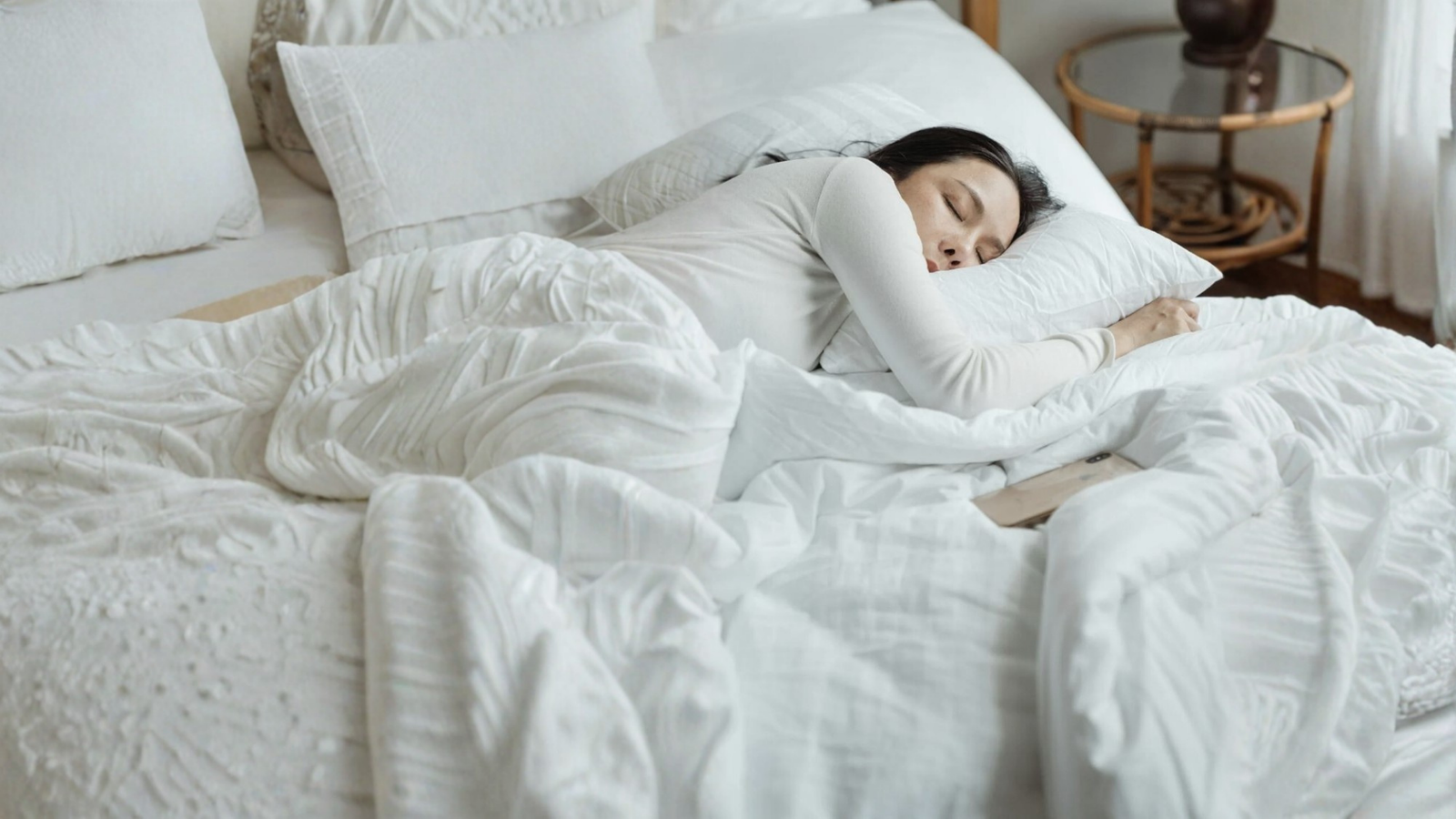 Anonymous person lying in bed